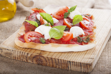 pizza pomodoro, vegetarian and homemade isolated on white background