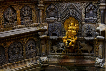 Fototapeta na wymiar sacred golden water fountain inside the palace in Lalitpur Nepal