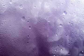 Purple Grape juice in ice macro shot
