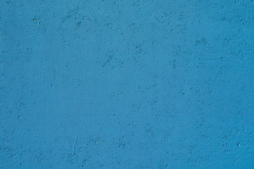 Blue plaster wall texture. Empty plaster background