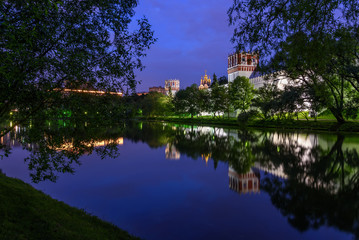 Fototapeta na wymiar night Moscow Novodevichy monastery river reflection