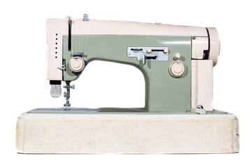 Old sewing machine. Vintage sewing machine on white background.