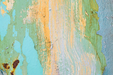 Yellow paint smears on a metal surface. Old metal texture for background