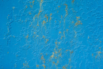 Blue flaking paint on on old metal surface. Old metal texture for background