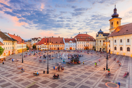 Sibiu, Romania. Large Square (Piata Mare) with the City Hall and Brukenthal palace in Transylvania.