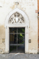 Venice, Veneto / Italy- May 20, 2017: Typical Venetian portal on the street called "Rio Tera Lista di Espagna"