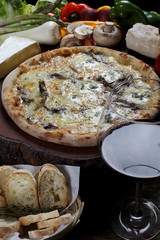 Pizza with glass of red wine