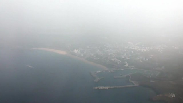 Aerial view of Penghu Island from a plane that is landing. Penghu Island is an outlying archipelago located in the Taiwan Straits between Taiwan and China. 