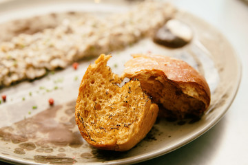 Grilled brioche and mushroom caviar on plate, Nordic cuisine, to