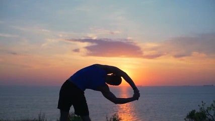 Silhouette Man stretching Tilt the Body to the Side workout outdoor slow motion
