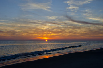 Sun Dips Below Horizon on the Beach