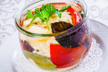 Pickled vegetables in a glass jar