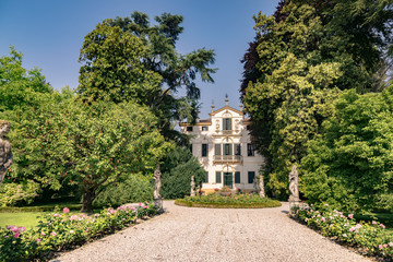 Fototapeta na wymiar Typical eighteenth-century Venetian villa surrounded by an Italian garden.