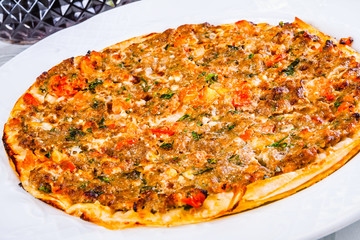 Lahmacun. Armenian flat bread stuffed with meat