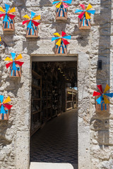  Windmill souvenirs on stone wall