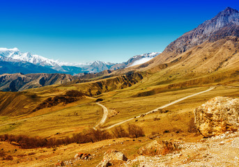 beautiful landscape of deserted Caucasus mountains with road, Russia, Republic Ingushetia