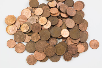 Pile of euro coins money isolated white background. / Many of small euro gold coins for design and background.