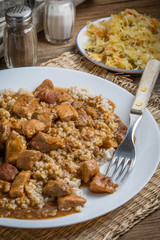 Barley groats with stewed meat.