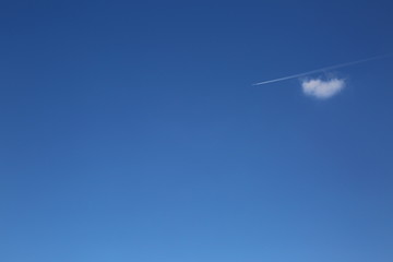 Blue sky with few white clouds