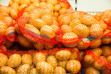 Potatoes in supermarket stand