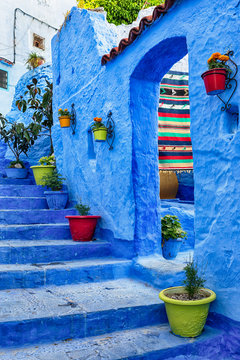 Famous blue medina with colourful details in Chefchaouen, Morocco.