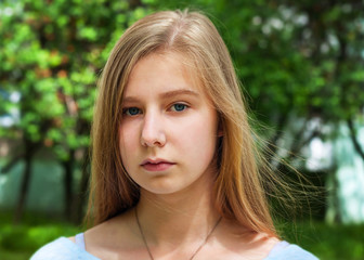 Fototapeta premium Portrait of the girl on the street.