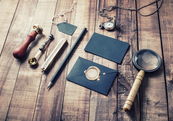 Vintage still life. Stationery set on wood background. Responsive design mockup for placing your...