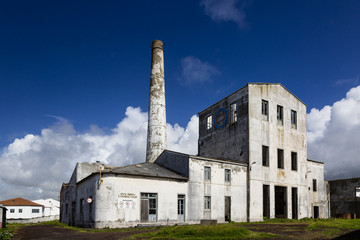 Fototapeta na wymiar Old abandoned factory in Lagoa on the island of Sao Miguel.