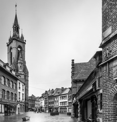 Buildings and tower in the town centre, black and white, Belgium.
