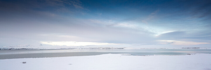 Horizontal, panoramic snow covered landscape scenic at day, Iceland, Europe.