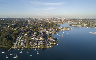 Obraz na płótnie Canvas Aerial view of the Parramatta river and the Sydney city skyline