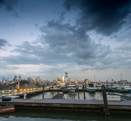 Fototapeta na wymiar View across marina towards buildings in New York City, New York, USA.
