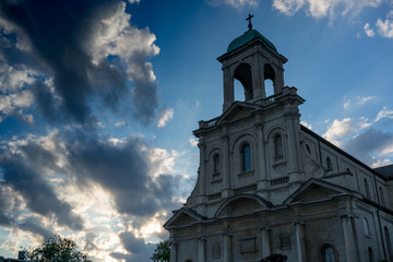 Fototapeta na wymiar Low angle view of church with dramatic clouds in blue sky Ontario Canada