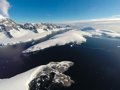 Rare aerial footage of Port Lockroy area, Antarctica. Really high above ground. Unbelievable beauty of nature.