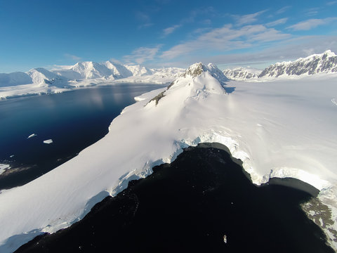 Rare aerial footage of Port Lockroy area, Antarctica. Really high above ground. Unbelievable beauty of nature.