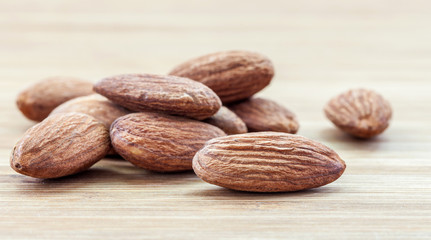 almond seed on vintage wooden table