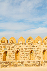 in oman    muscat    the   old defensive  fort battlesment sky and  star brick