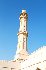 Fototapeta na wymiar in oman muscat the old mosque minaret and religion in clear sky
