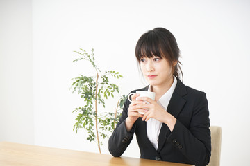 Business woman relaxing at cafe