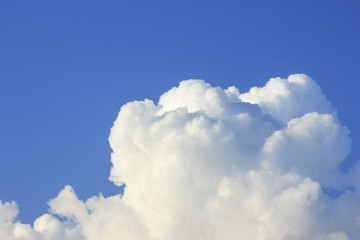 Big white cloud on blue sky
