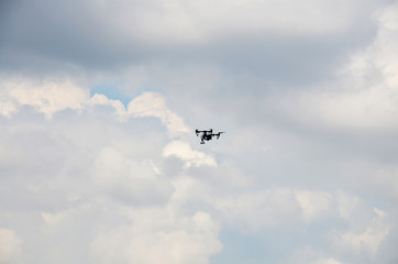 Naklejka na ściany i meble Surveillance drone flying