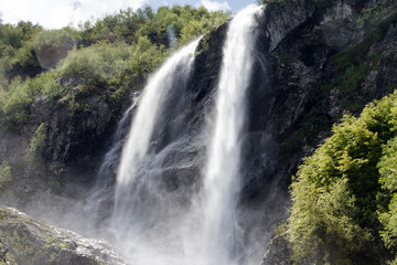 Fototapeta premium Polikar Waterfall on the slope of the mountain near the Krasnaya Gorki of the Krasnodar Region