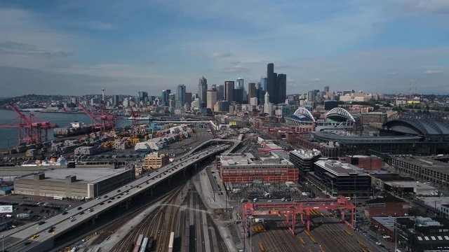 Seattle Aerial v95 Flying low over shipyard area with cityscape views 4/17