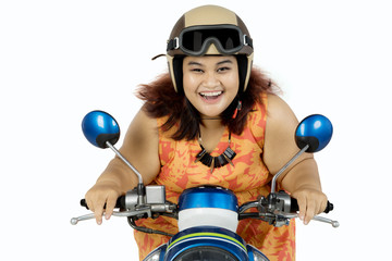 Fototapeta premium Fat woman driving motorcycle