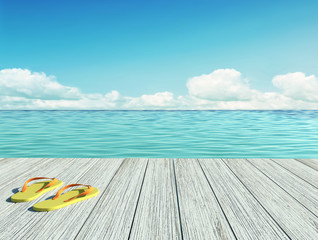 Fototapeta na wymiar Yellow flip flops on a wooden floor by the seashore