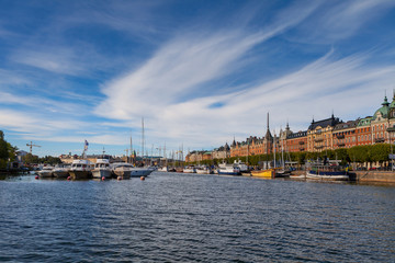 Naklejka premium STOCKHOLM - SEPTEMBER, 15, 2016: Boats along street of Stockholm