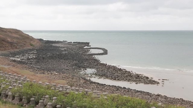 Shore of a beach on Penghu Island, Taiwan. Penghu Island is an outlying archipelago located in the Taiwan Straits between Taiwan and China. 