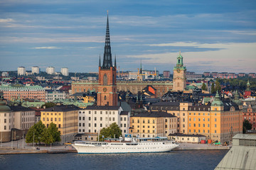 STOCKHOLM, SWEDEN - SEPTEMBER 16, 2016: Aerial view of central part of old town with embankment and ship.
