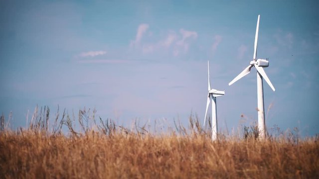 Wind energy turbines are one of the cleanest, renewable electric energy source. Electricity is generated by electric generators hidden inside turbine.