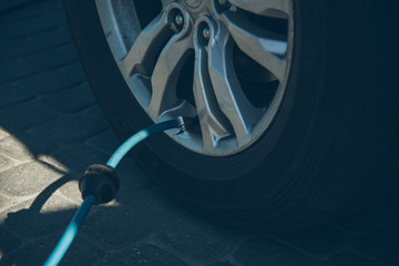 Man checking tires before long trip